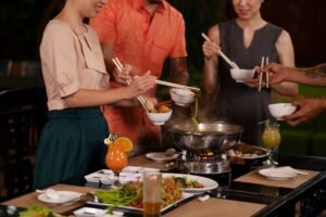 asian-people-having-dinner-party_23-2149552668